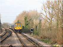 TQ2565 : Train approaching Sutton Common by Stephen Craven