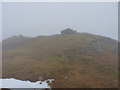 NN2018 : Summit clutter & cairn on Beinn Bhuidhe by Richard Law