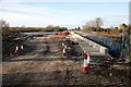 Flood alleviation works continue on a sunny morning