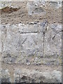 Benchmark on town wall tower on Y Promen?d, Caernarfon