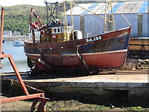 NM6796 : Mallaig slipway and beached fishing boat by Rob Newman