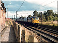 Electric train passing through closed Beattock station