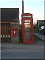 Postbox and telephone kiosk