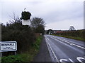 TM3761 : B1121 Main Road entering Benhall  and Benhall sign by Geographer