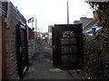 Gated access lane at the rear of High St and Queen St, Barry