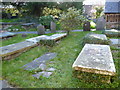 Some very old slab gravestones in the cemetery at St. Benedict