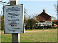 Sign beside field margin that is not a public access