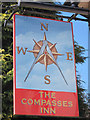 The Compasses Inn sign