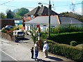 Bus stop, pharmacist and electricity pole, Bulford Road, Durrington