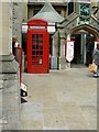 K6 telephone kiosk by the Carfax Tower, Queen Street, Oxford