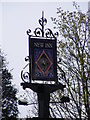TG2136 : New Inn Public House sign by Geographer