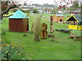 Totem and other carvings at Sheuchan Primary School