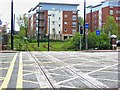 Manchester Metrolink crossing Trafford Road (A5063), Salford Quays, Salford