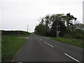 NT9443 : Crossroads at the foot of Matilees Hill in Northumberland by James Denham