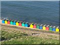 NZ8811 : Beach huts, Whitby Sands by David Martin