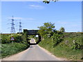 TM3356 : Bucks Head Railway Bridge on Ashe Road by Geographer