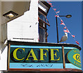 Cafe sign with ever-present gull