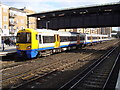 Overground Train at Kensington Olympia station