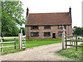 TM1499 : Entrance to High House Farm, Wreningham by Evelyn Simak