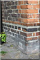 Benchmark on Pilgrim House, Tabard Street