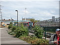 DLR train rounding the corner from Canning Town station