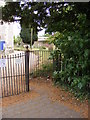 TM3055 : Kissing Gate at the entrance to All Saints Church by Geographer