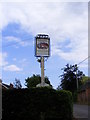 The Greyhound Inn sign