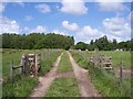 Footpath crosses farm track near Burscough Hall Farm