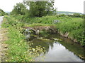ST3960 : Small twin arched bridge over the River Banwell with flow gauge by Dr Duncan Pepper