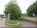 Drive, lane and main road, Rhodyate Hill