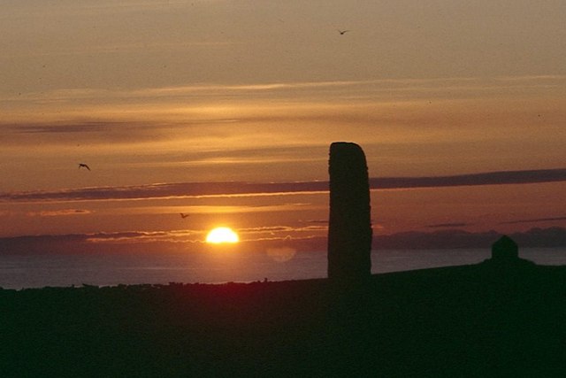 Midsummer sunset at the North Ronaldsay standing stone There appears to be no significance to the alignment of the stone according to the solstice, although the stone does appear to aligned with the setting sun at the equinox.