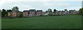 Field and modern houses in Tupton