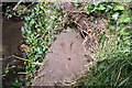 Benchmark on top of culvert on south side of Brook Street