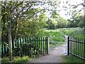 Gate into Monks Brook Greenway