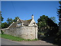 The gates and lodge to Caythorpe Court