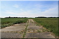 TM1881 : Concrete track on Thorpe Abbotts airfield by Glen Denny