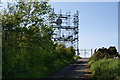 NY1738 : Lane up to the communications mast on Wharrels Hill by Bill Boaden