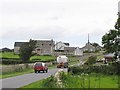 Traffic climbing up the steep eastern section of Dougans Road