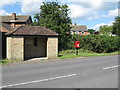 Post box and bus stop at The Green