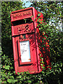 Post box by Udimore Road