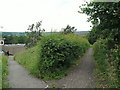 Footpath between railway and college at Hadfield