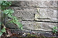 Benchmark on wall at entrance to Bingley Railway Tunnel