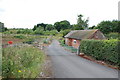 Old Building and Drainage Pool on the side of the A38