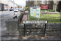 Benchmark on wall corner pier of St John the Evangelist Church