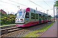 Midland Metro tram no. 09 approaching Priestfield tram stop, Wolverhampton