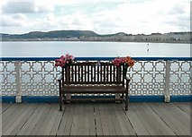 SH7882 : Memorial bench on Llandudno pier by Gerald England