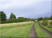 TM3569 : Track to Peasenhall Primary School Playing Field by Geographer
