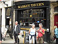 Market Tavern with tourists outside