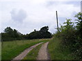 TM4266 : Footpath to Pretty Road & entrance to Dovehouse Farmr by Geographer