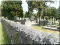 Stone wall and the edge of Llangadog Cemetery